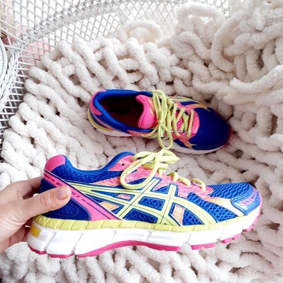 multi colored athletic shoes